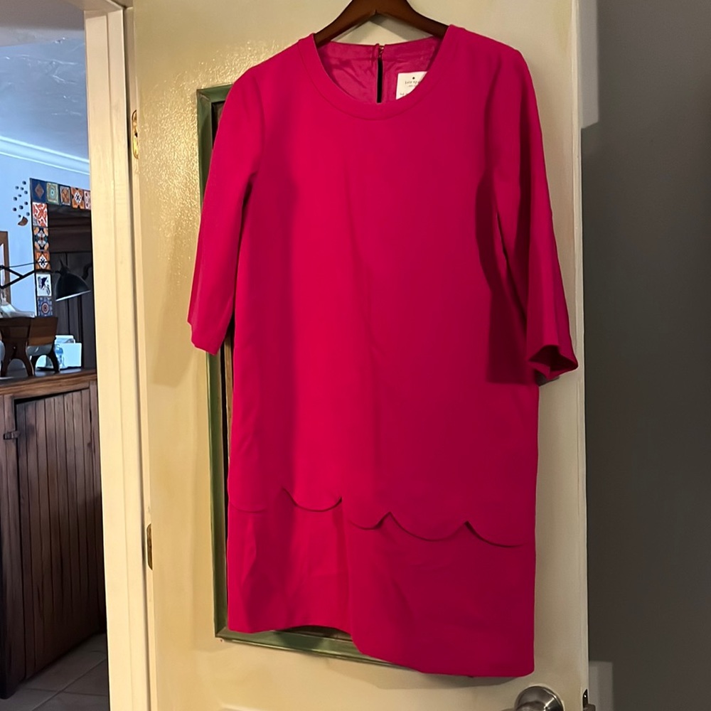 Never worn hot pink Kate Spade mini size 8 with scalloped hem.